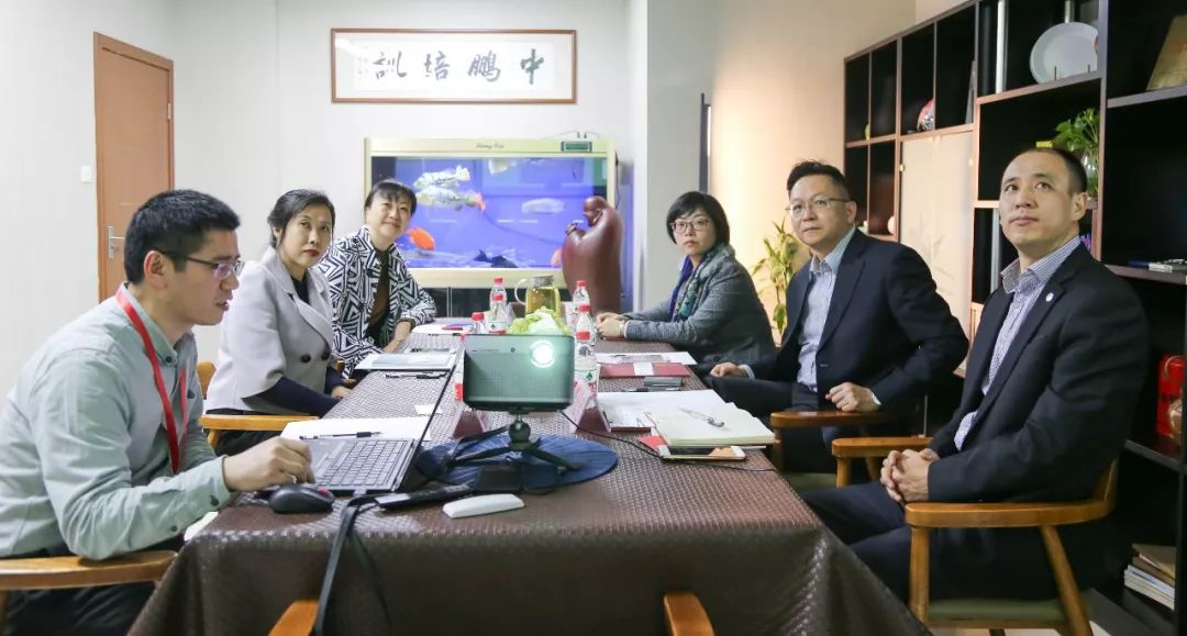 the dean of the school of continuing education (open) of guangdong university of foreign studies and foreign trade and his party visited zhongpeng for education guidance